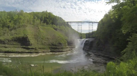 Waterfall under bridge in canyon Stock Footage 23886020