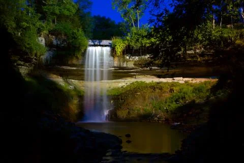 Waterfall under the lights Stock Photos