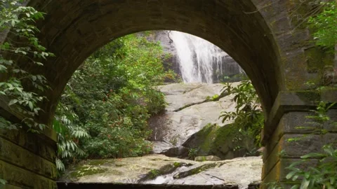 Waterfall Under A Small Bridge Footage Stock Footage 156524374