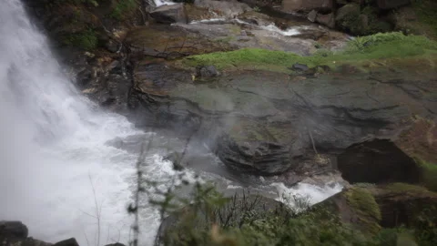Waterfall vapour clouds hit the rock at the bottom Video stock 261805110