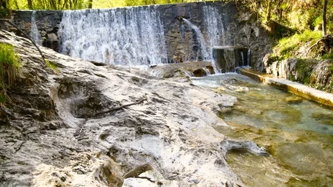 Waterfall at the Vertova stream Stock Footage 107460996