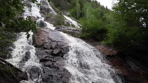 Waterfall view l'Anse-Saint-Jean Quebec hiking trail Stock Footage 248869529