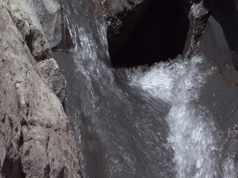 Waterfall on volcanic rock Stock Footage 52075618