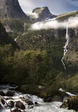 Waterfall on the way to Briksdal glacier Foto stock