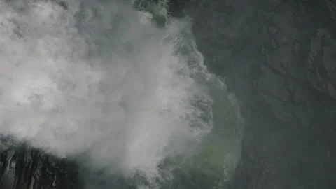 Waterfall in the wilderness captured in slowmotion version 2 Stock Footage 255392947