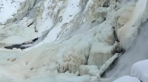 Waterfall in the winter forest Stock Footage 64464903