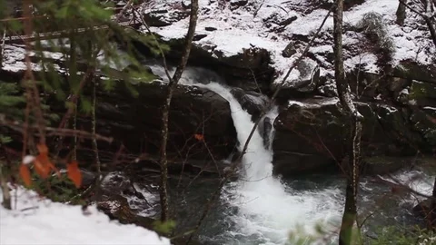 Waterfall at the winter forest Stock Footage 84728583