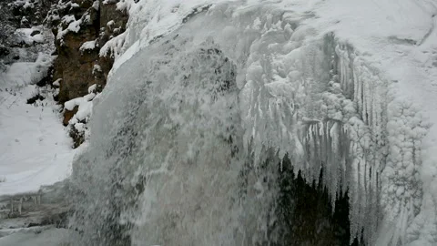 Waterfall in the winter in the mountains. Video stock 121901667