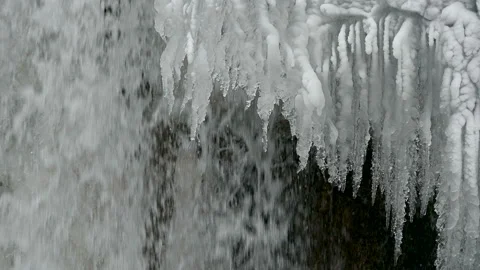 Waterfall in the winter in the mountains. Video stock 121902801