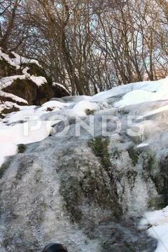 Waterfall in winter Stock Photos