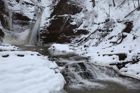 Waterfall in the winter Stock Photos