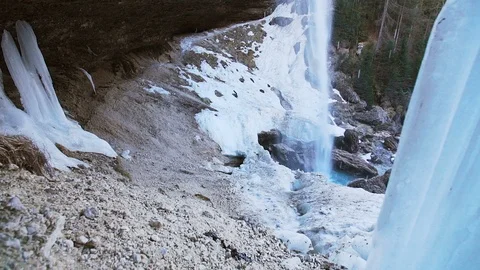 A waterfall in the winter surrounded by ice Stock Footage 103221860