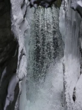 Waterfall in wintertime Stock Photos