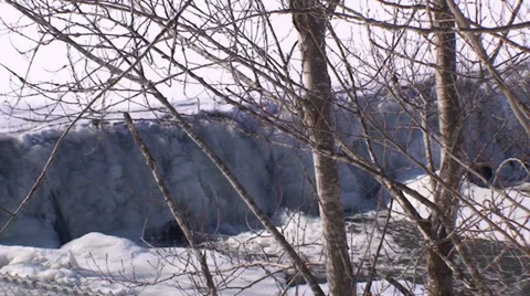 Waterfalls and river in the winter time. Video stock 35990462