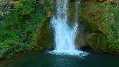 Waterfalls cascade into deep green pools. Veliki Buk, Serbia. Stock Footage 336888012