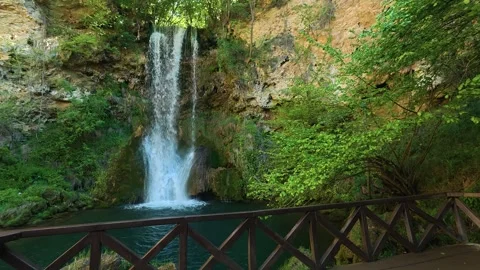 Waterfalls cascade over mossy rocks into calm pools. Veliki Buk, Serbia. Video stock 336888555