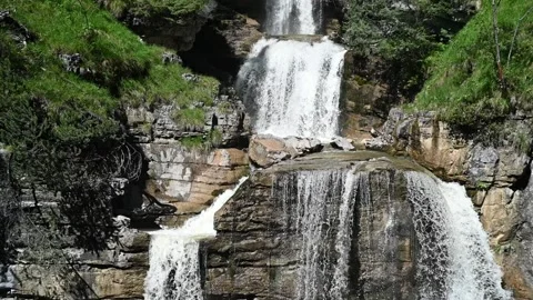 Waterfalls cascade over rocks (slow motion) Stock-Footage 219364210