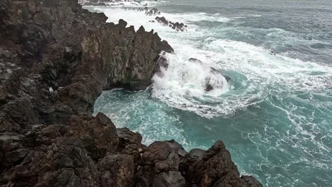 Waterfalls cascading down coastal cliffs in Madeira Portugal Video stock 339774547