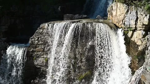 Waterfalls in direct sunlight (slow motion) Video stock 219382011