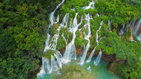 Waterfalls Flow In Green Mountain Forest Stock Footage 304112640