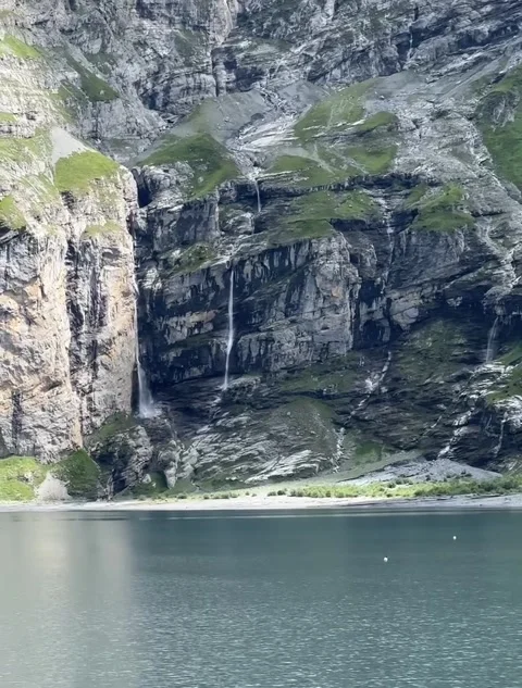 Waterfalls Flowing into Alpine Lake Stock Footage 340870239