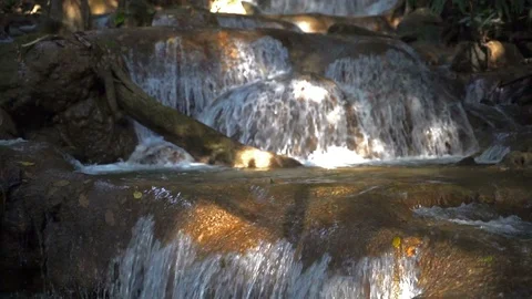 Waterfalls flowing on rocks Stock Footage 100259833