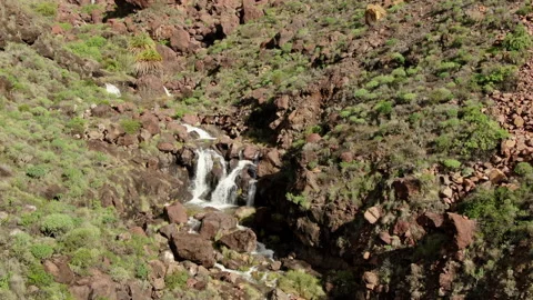 Waterfalls in Gran Canaria generated by the rain of Cyclone Herminia. Stock Footage 213021505