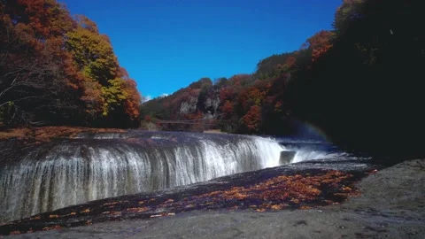 Waterfalls with red maple leaf in Japan Gunma. Stock Footage 221964709
