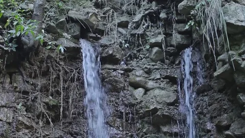 Waterfalls in the rocks, source, gushing water, source that flows, Video stock 83042668