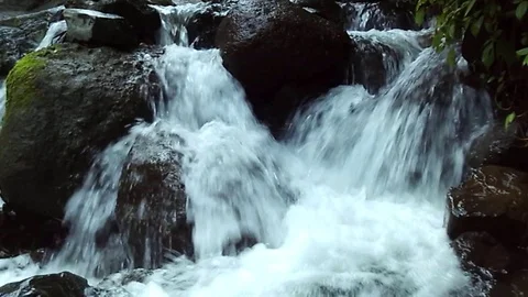 Waterfalls stream on the small river on the muria mountain Stock Footage 124774608
