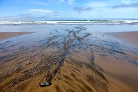Waterflow towards the Ocean. Stock Photos