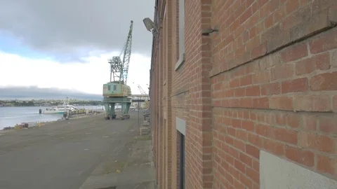 Waterfront abandoned warehouse Stock Footage 75939969