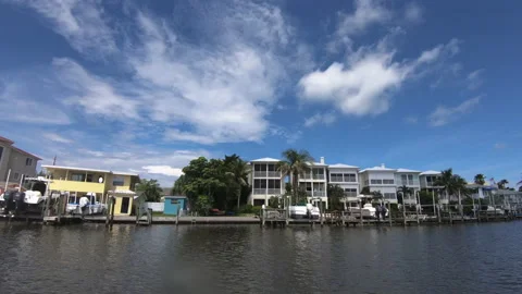 Waterfront building docks in Florida Stock Footage 147980074