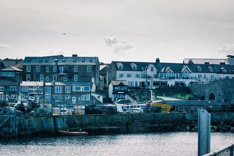 Waterfront Buildings and Harbor Elements at Seahouses Harbour, UK Stockfoto's