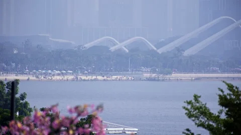 Waterfront Cityscape: Distant View of Buildings and Architecture Along Urban  스톡 동영상 322933478