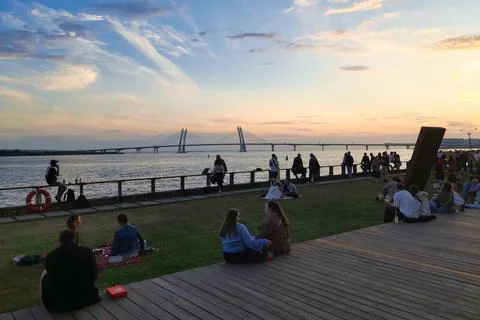 Waterfront Sunset with Cable-Stayed Bridge Stock Photos