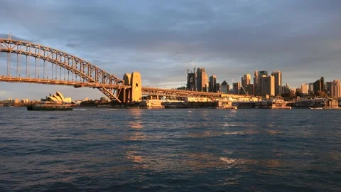 Waterfront of Sydney The rocks and CBD skyline in sunshine at sunset as 4k. Stock Footage 139501057