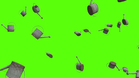 Watering cans exploding over green screen. Watering pots explosion Stock Footage 239124950
