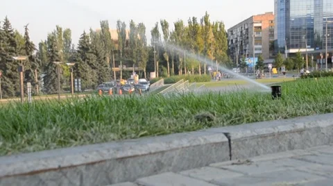 Watering of grass Vídeos de archivo 7745250