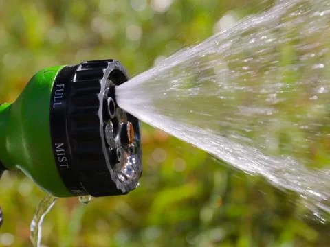 Watering hose Stock Photos