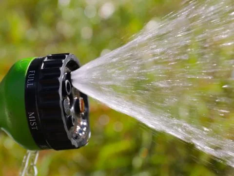 Watering hose Stock Photos