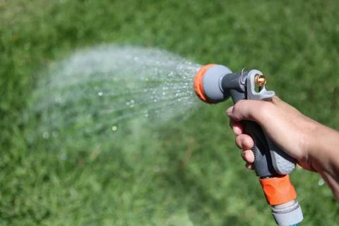 Watering the lawn Stock Photos