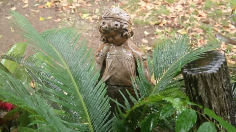 Watering Palm Statue Stock Footage 35684487