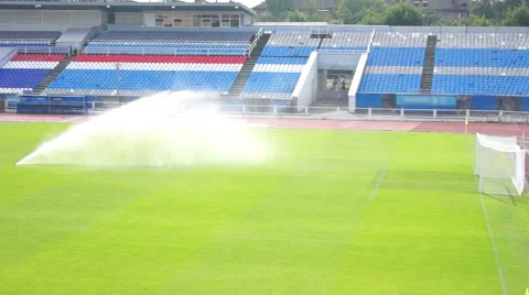 Watering the soccer field Stock Footage 65147472