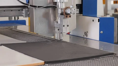 Waterjet cutting machine working on plastic foam sheet  - close up Video stock 158312288