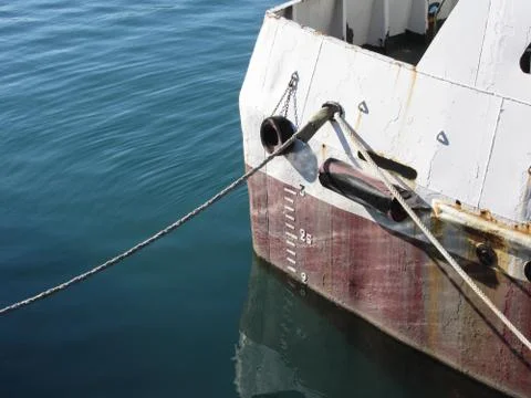Waterline marked on the ship with draft scale numbering Stock Photos