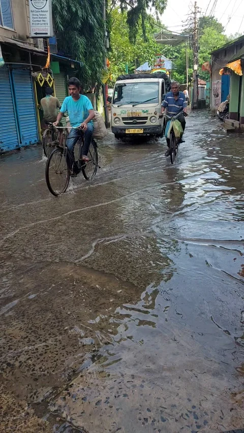 Waterlogged streets following continuous rainfall, Stock Footage 346484116
