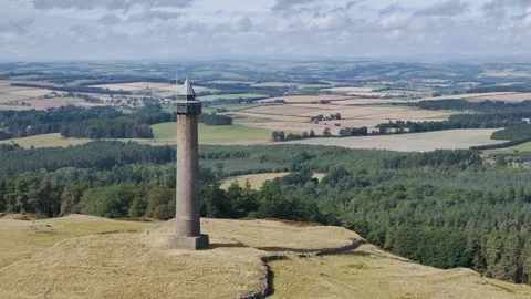 Waterloo Monument over Scottish fields and farms, Jedburgh, Scotland, UK Stock-Footage 317121785