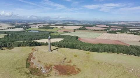 Waterloo Monument over Scottish fields from a drone, Jedburgh, Scotland Stock-Footage 318720718