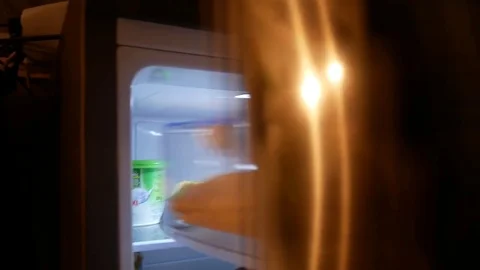 Watermelion in fridge Stock Footage 77884813